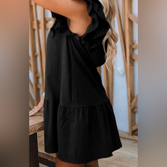 Summer dress with elegant ruffle design. - Picture 4 of 4